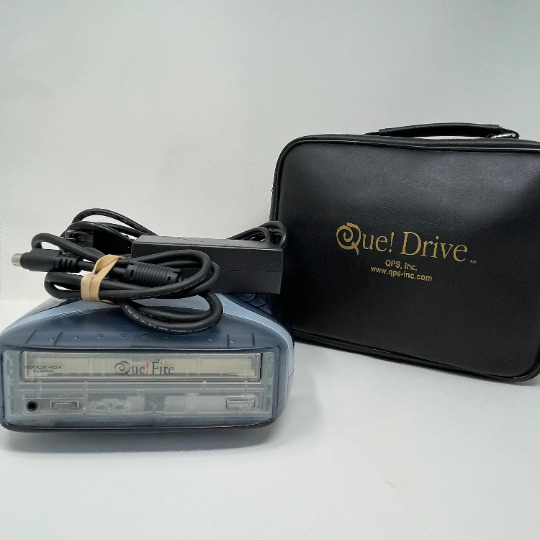 Vintage Electronic Que Fire Drive Model # QPS-525 Blue with Travel Bag