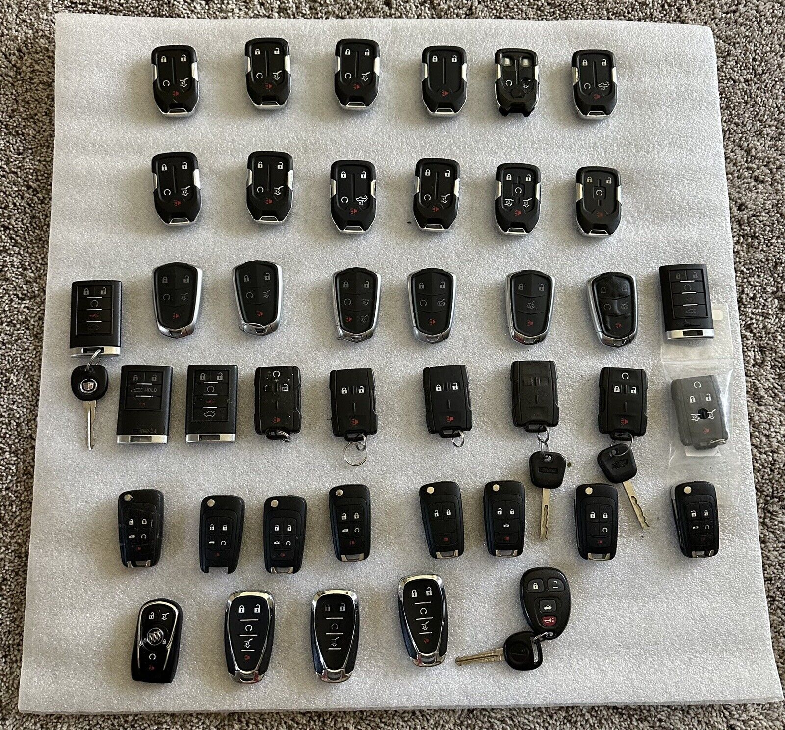 LOT OF 41 General Motors Key Fobs. Chevy/GMC/Cadillac/Buick fobs Included