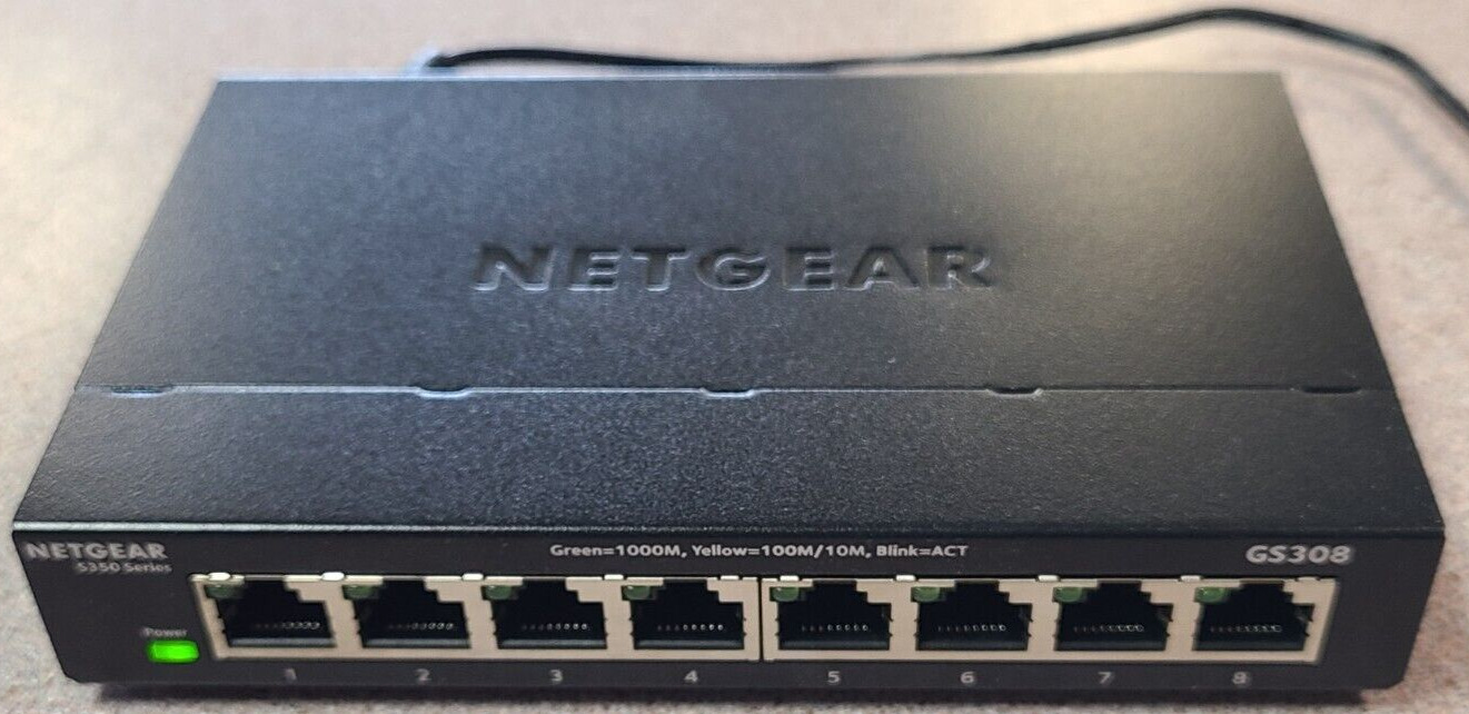 NETGEAR S350 Series GS308v3 8-Port Gigabit Ethernet Switch & power adapter