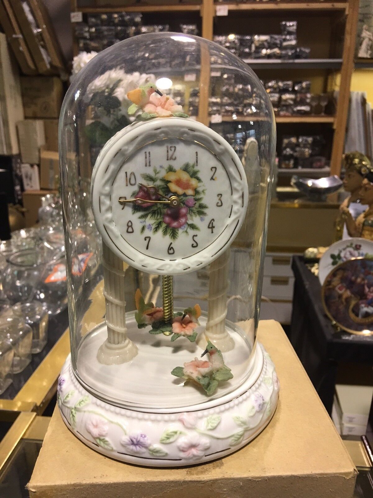 An AVON EXCLUSIVE WEIGHTED TABLETOP HUMMINGBIRD Clock Unused New In Box