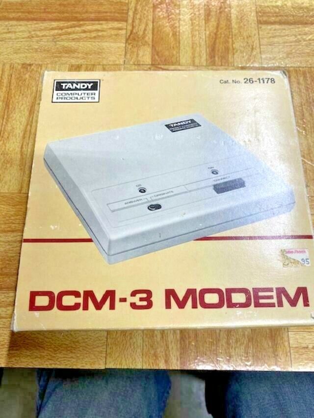 Tandy DCM-3 modem in box with power supply - no manual