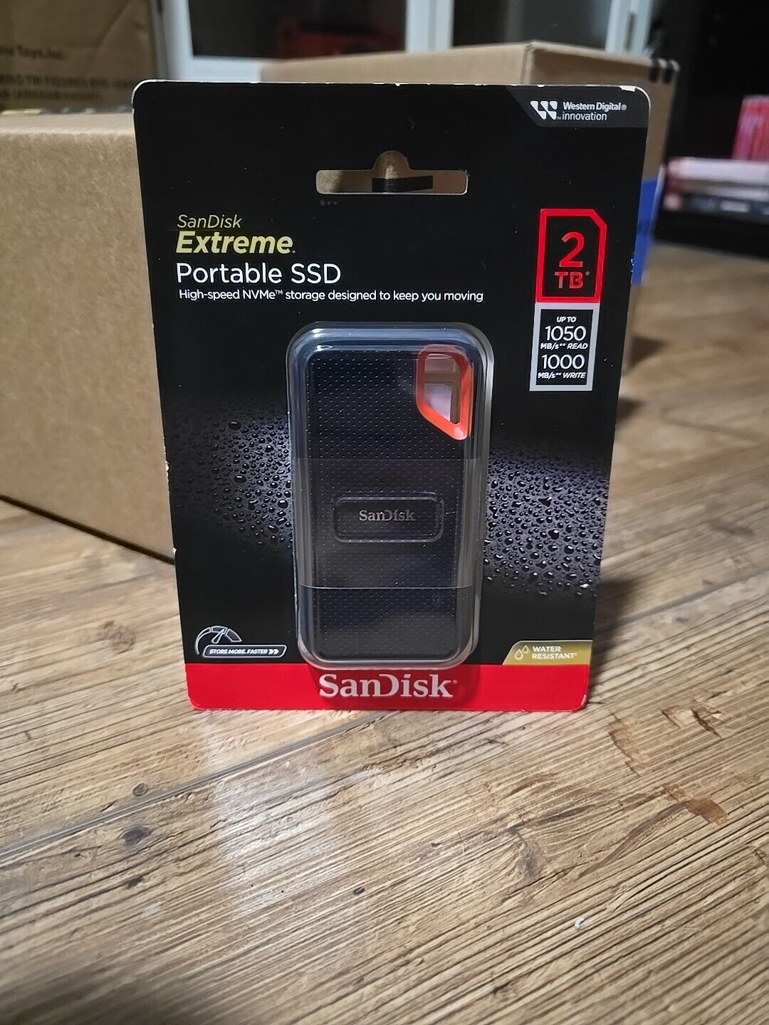 NEW SanDisk 2TB Extreme Portable Solid State Drive, Black - SDSSDE61-2T00-AT