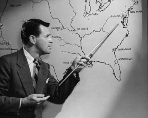 Posterazzi Businessman pointing with a pointer stick on the map of (24 x 36) 