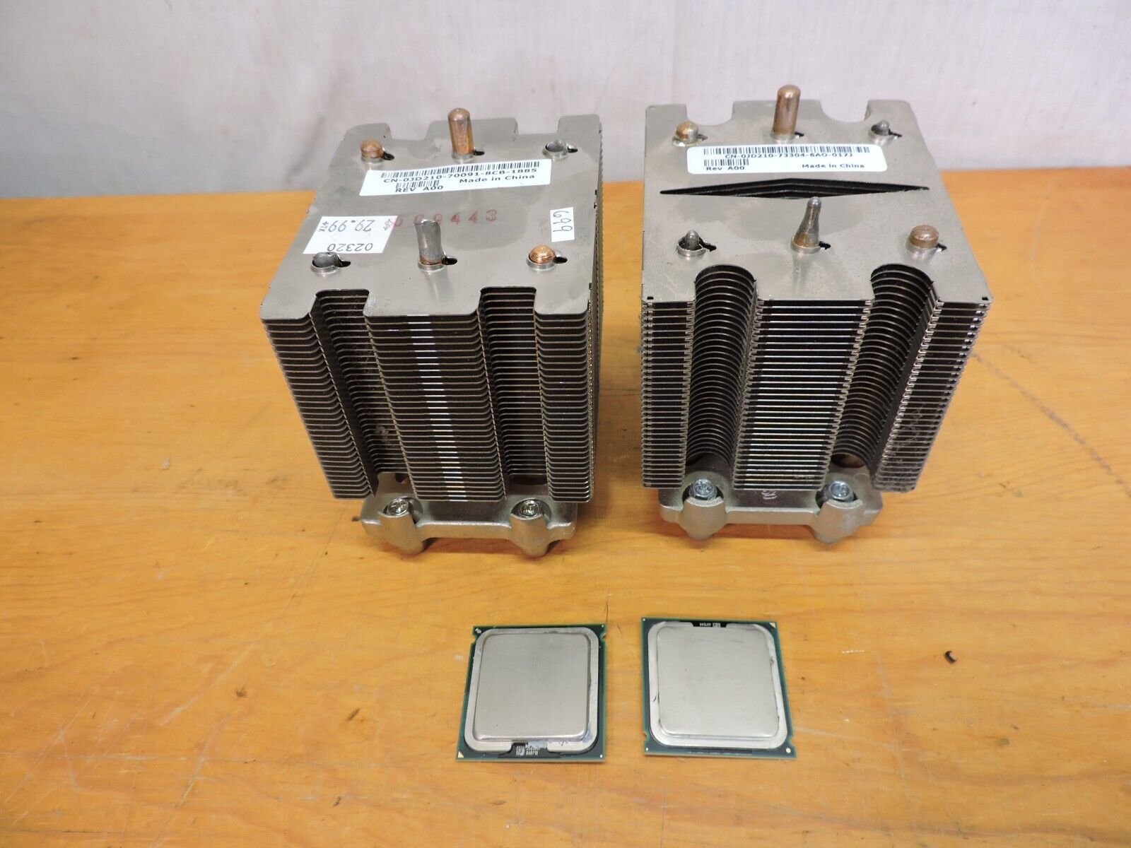 Pair of Intel 2GHz/4M/1333 Intel Xeon Processors and Heat sinks. Tested  Working