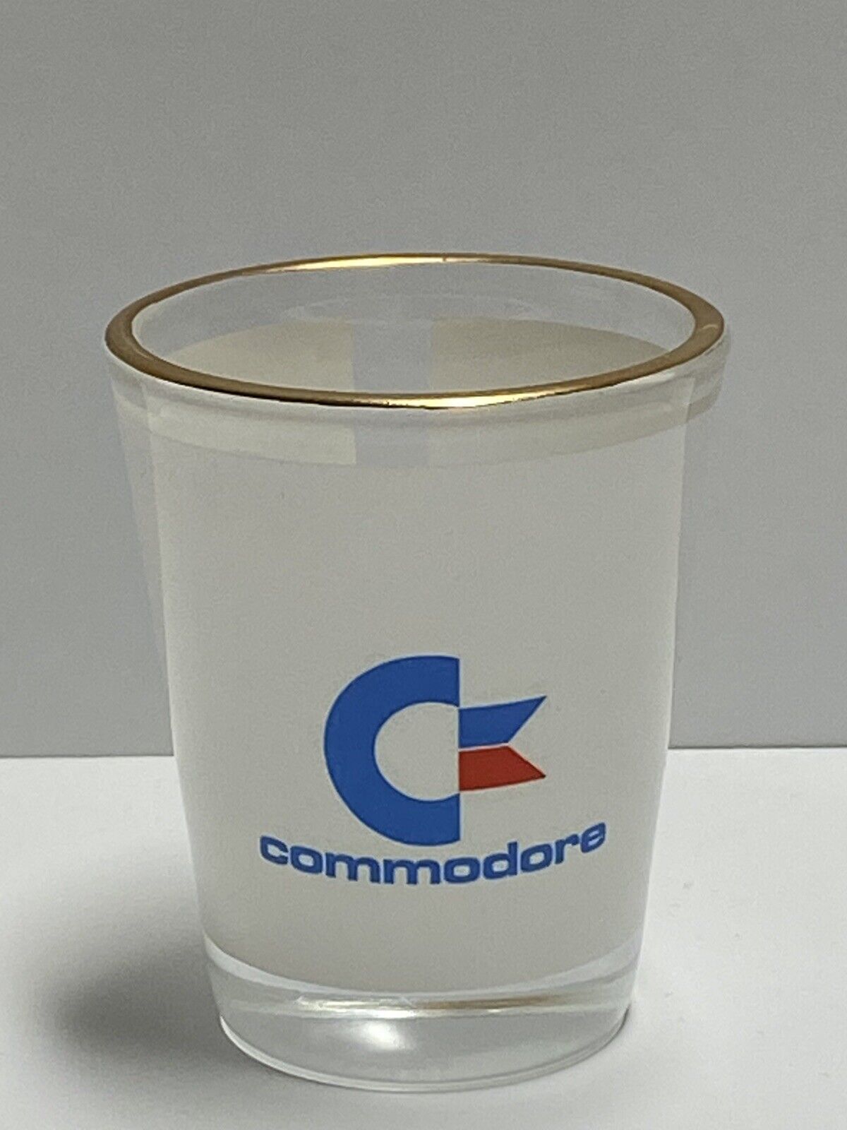 Commodore Computer Gold Rim Shot Glass