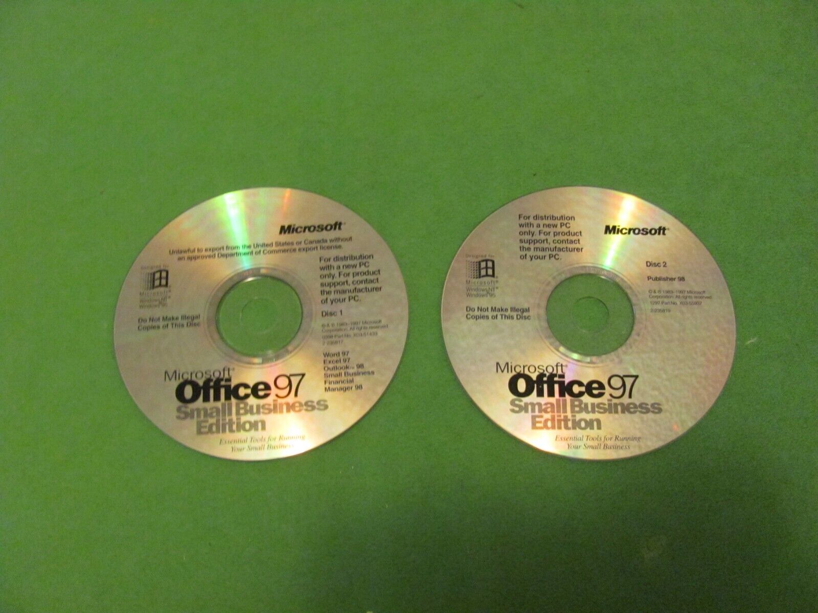 Lot of 2 Vintage Microsoft Office 97 Small business Edition Disc 1 & 2.