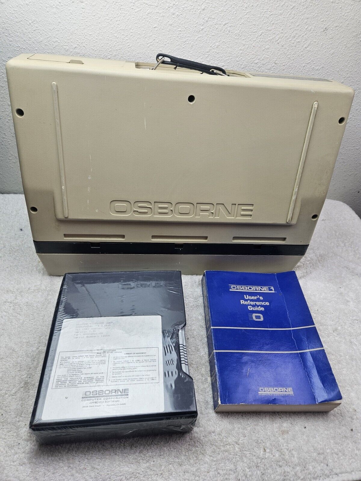 VINTAGE OSBORNE COMPUTER  10- 20-1982 SERIAL # 004319  SEALED SOFTWARE TURNS ON