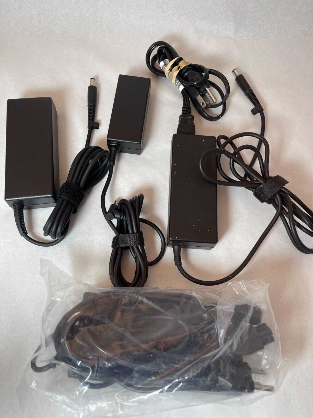 Lot of 7 Dell, HP, Misc laptop power adapters
