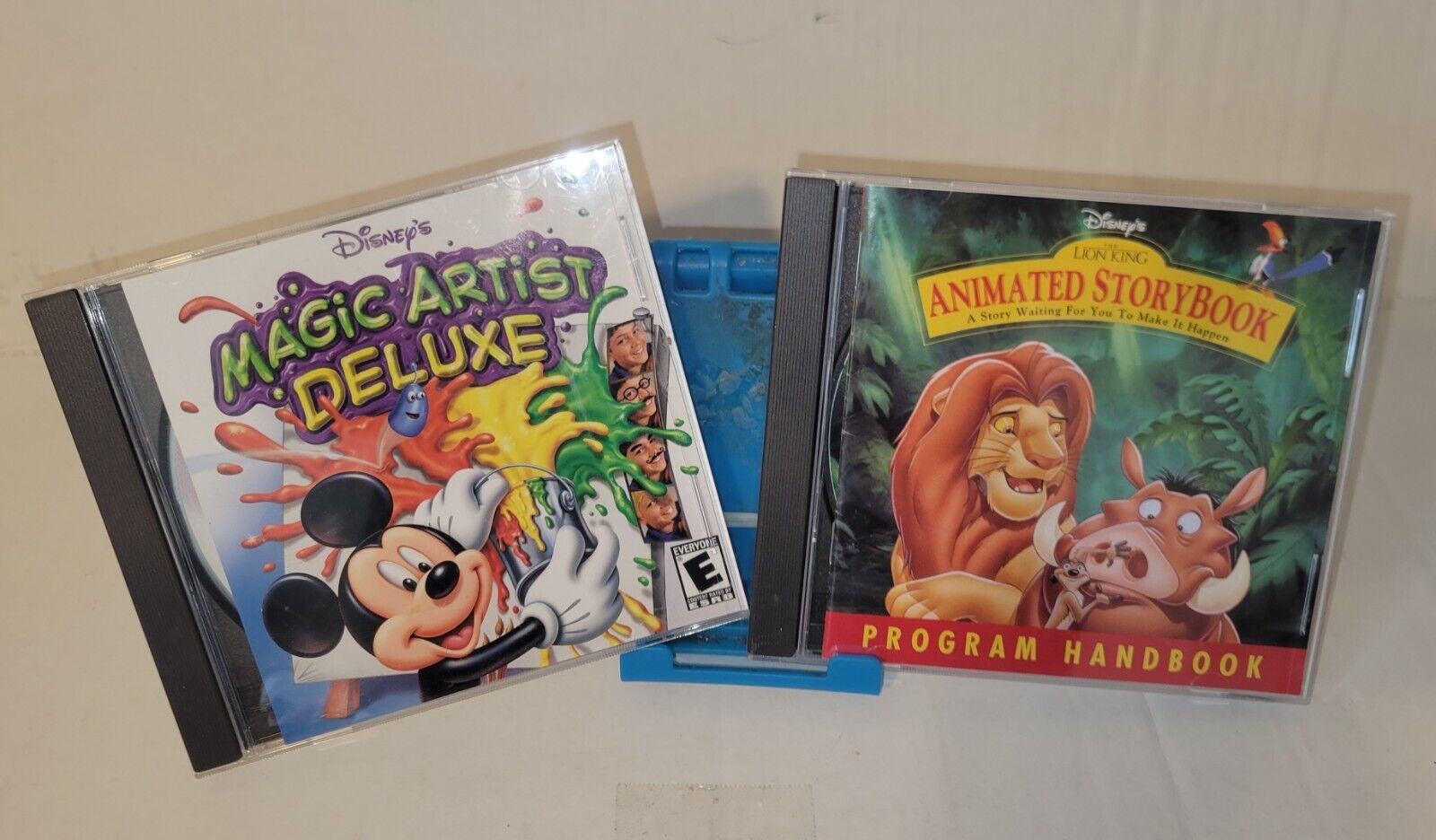 (2)Walt Disney's CDs: Magic Artist Deluxe & Lion King Animated Story Book.Pc/Mac