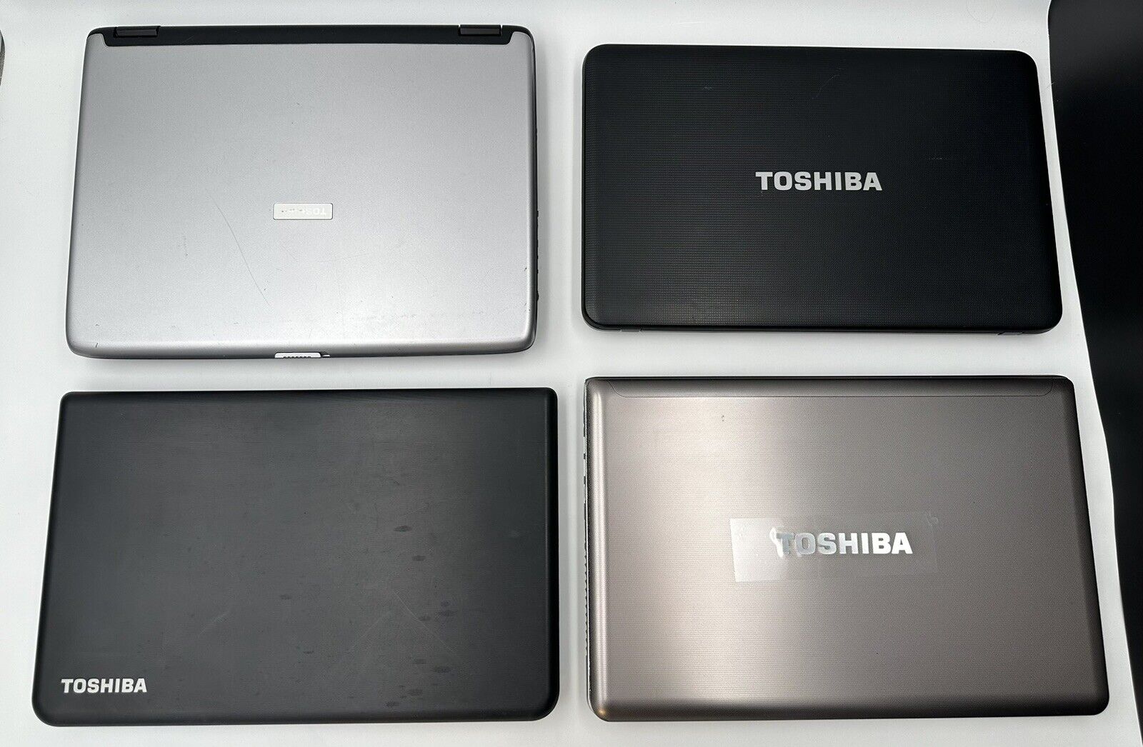 Lot of 4 | Toshiba Satellite Laptops Assorted Models