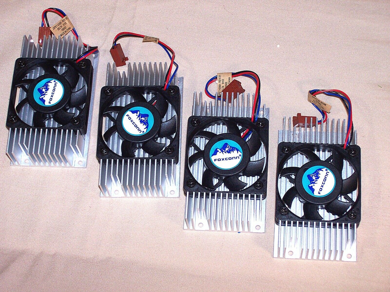 (Lot of 4)  NOS Foxconn heatsink with fans 12VDC 0.15A PKCO18000D12
