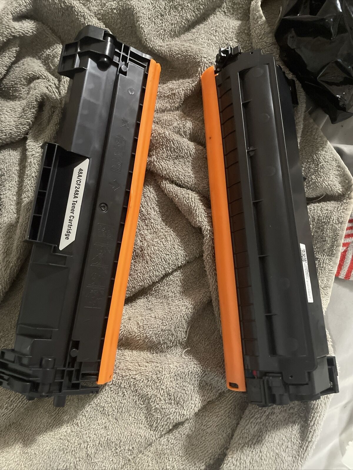 2x CF248A Black Toner One Of The Orange Covers Has A Crack In It. Still Works