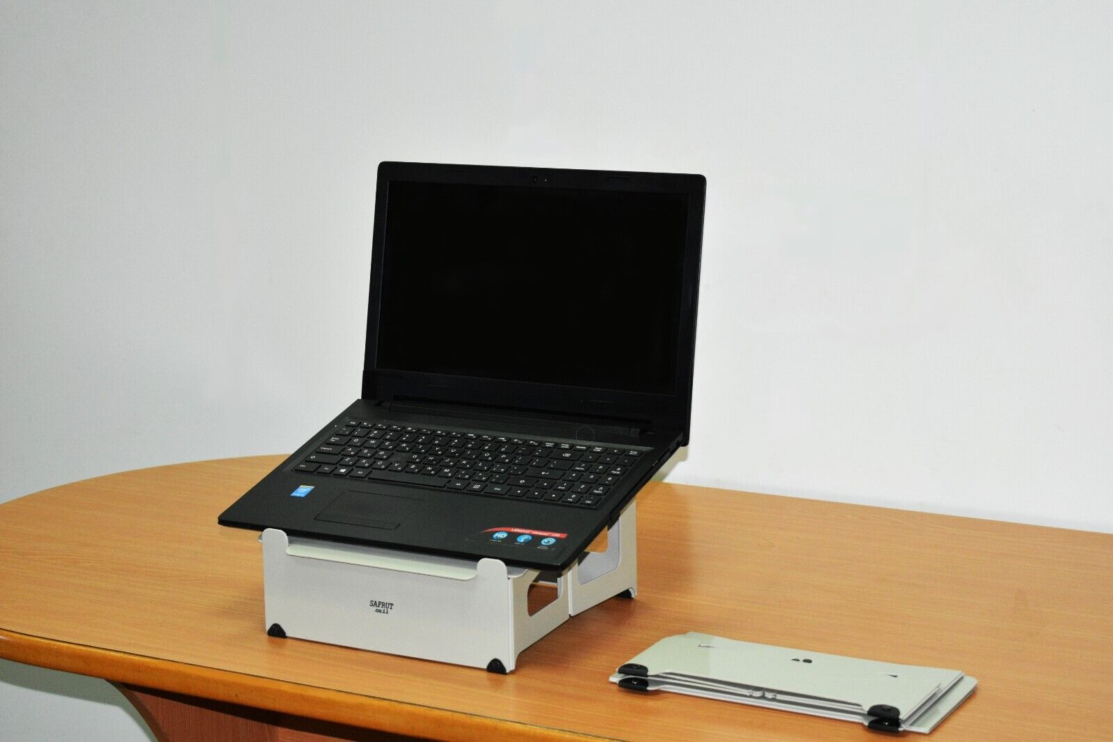 Portable tilted Laptop Stand 16 cm tall. Flat folding Riser for seated work.