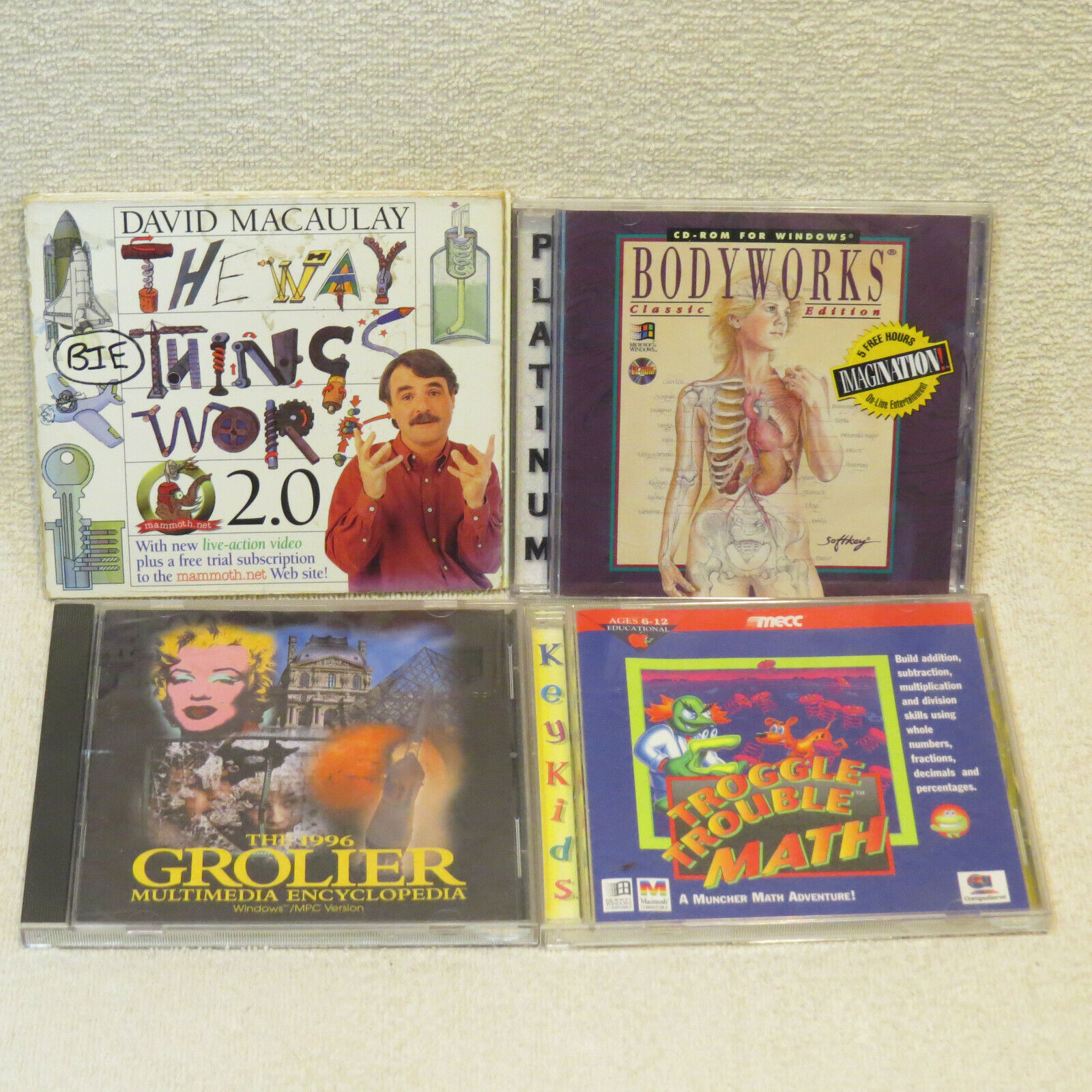 Vintage Lot of 4 Learn/Reference CDs Bodyworks/Encyclopedia/Way Things Work/MATH