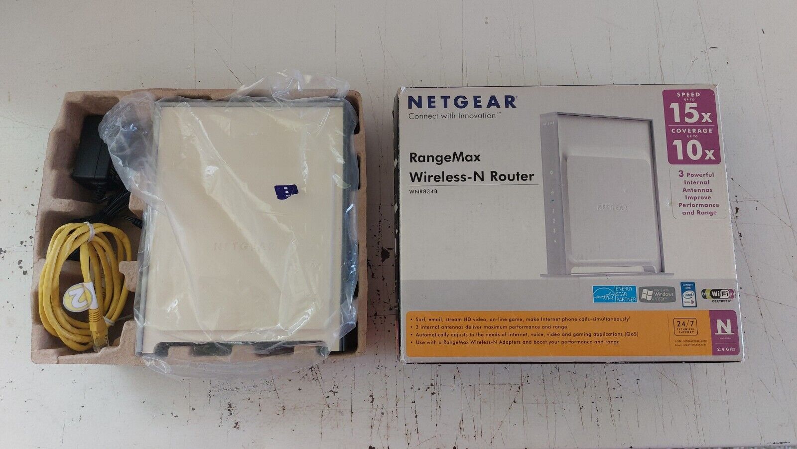 NETGEAR WNR834B Rangemax Router (Old, but still works.) 