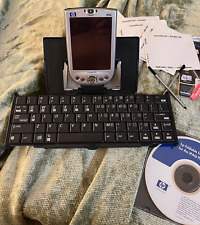 hp iPAQ pocket pc with all CDs, charger, standup and extendable keyboard w/pens picture