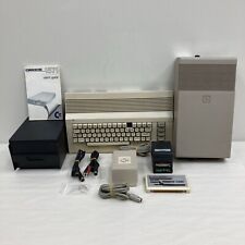 Commodore 64 System Lot Untested w/ Cables Disc Drive Floppys Cartridges Etc picture