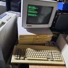 Very nice Epson Equity 1 with the original, keyboard, monitor and software picture