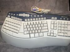 Vintage Microsoft Natural Multimedia Keyboard PS/2 RT9470 - 1.0A - White/Blue picture