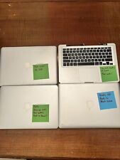 Lot Of Four MacBook Computers picture