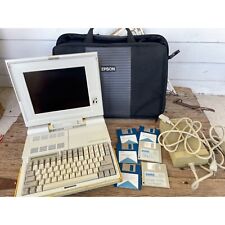 Vintage 1980s Epson Equity LT-285e Laptop Computer case/chord /discs Powers on picture