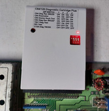 Commodore 64 128 Diagnostic cartridge multirom rev 586220 785260 cover boxed picture