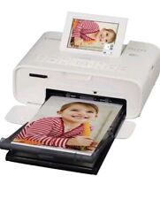 Canon Selphy CP1300 Wireless Compact Photo Printer with AirPrint Device Printing picture