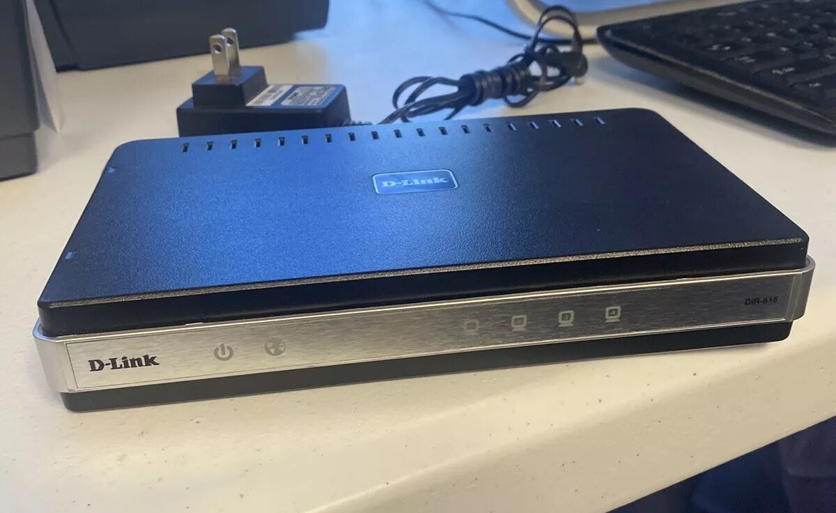 D-Link DIR-615I1  Wireless-N 300 Wifi Router 4 port w/Ethernet Connection.  Used