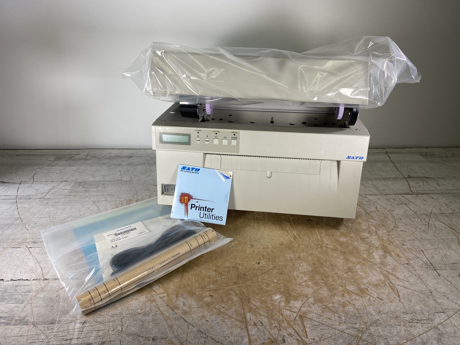 SATO M-10E INDUSTRIAL THERMAL LABEL PRINTER W/ ORIGINAL PACKAGE - (POWER TESTED)