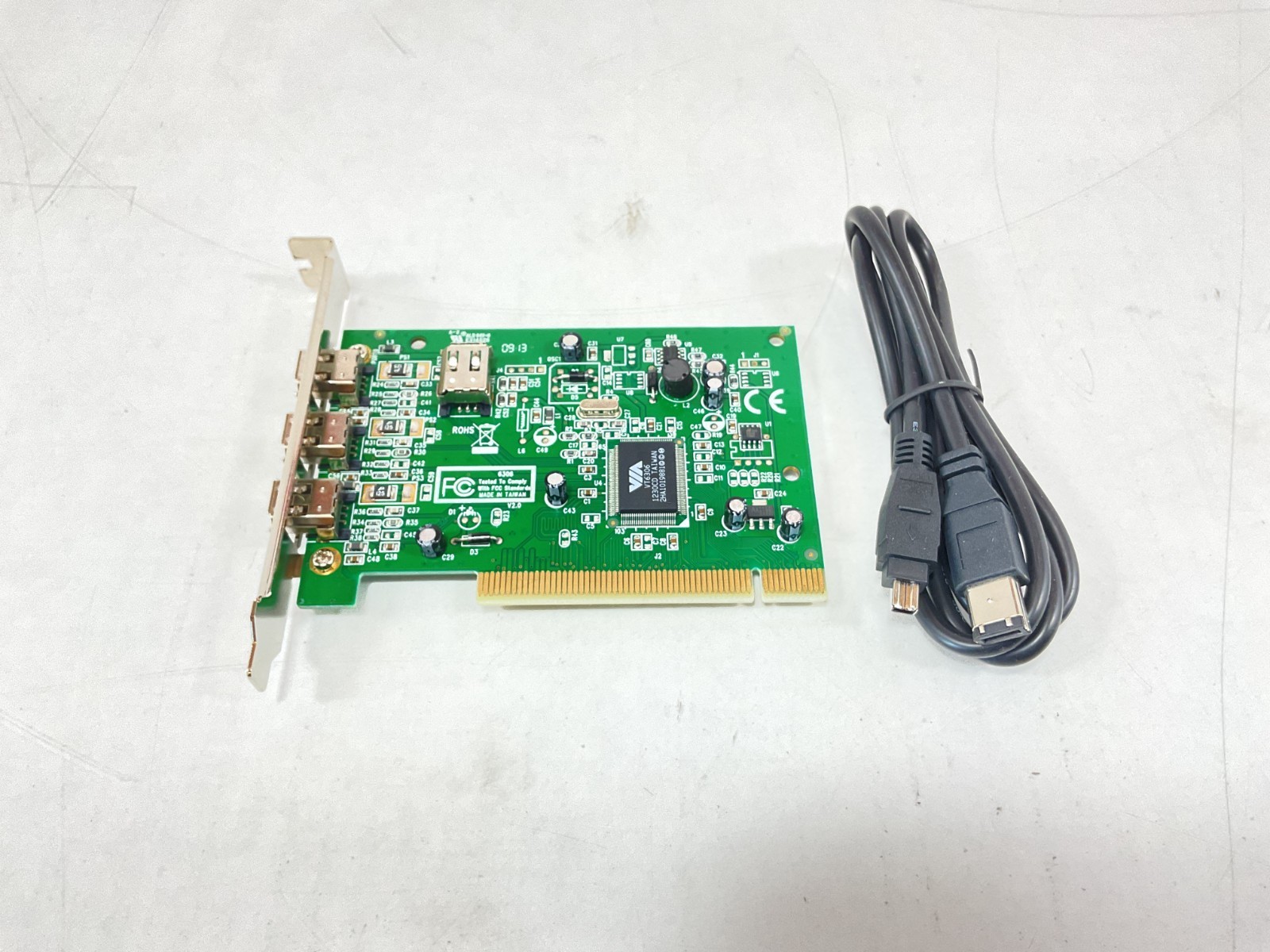 StarTech 4-Port PCI 1394a FireWire Adapter Card - PCI1394MP