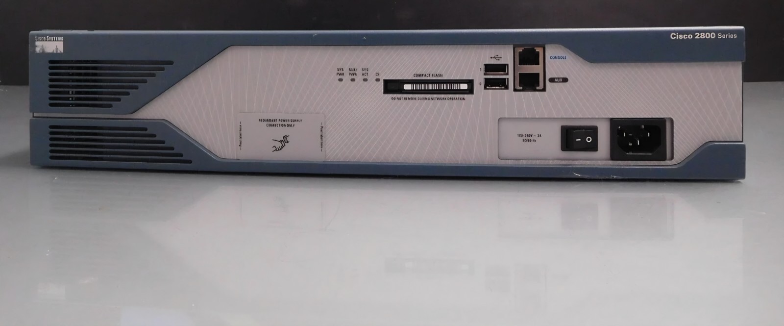 Cisco 2821 K9/SEC/IPVOICE Router w/ 2x Serial 1x VIC-2FXO - 1x NM-HD-2VE MODULE