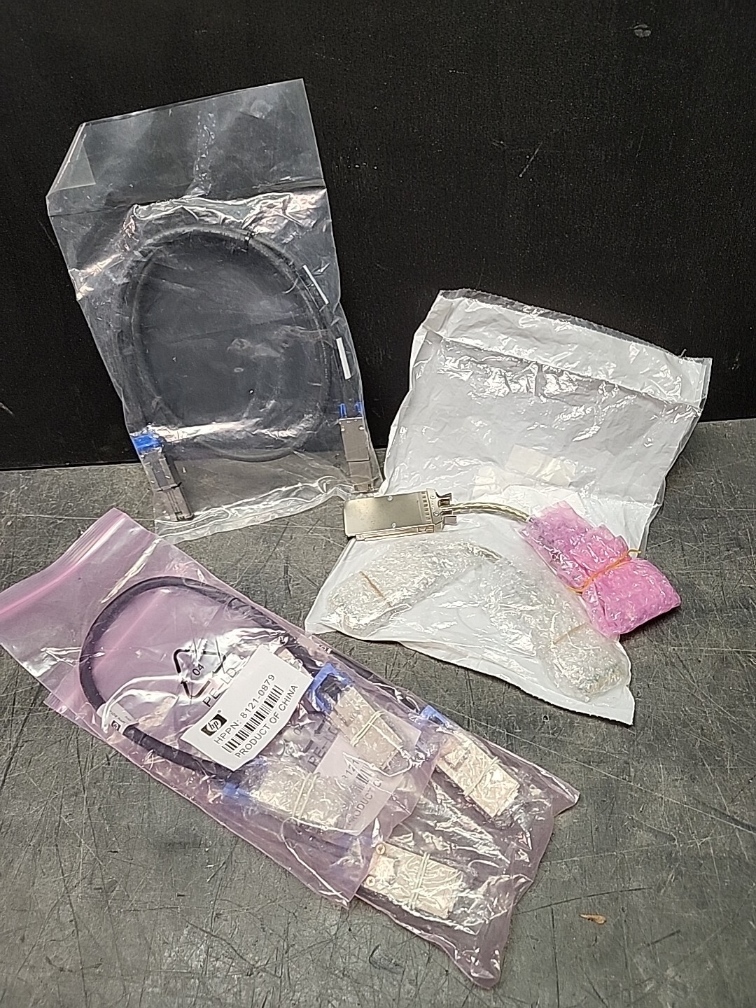 LOT OF CABLES:  (2)HP 8121-0879     (2)QLOGIC 11834-00 (1)OEM35-00000313-00-02