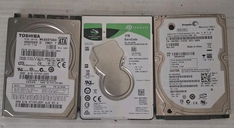 Seagate 2E7172-500 ST1000LM048 1TB 5.4K RPM 128MB Cache  SATA 2.5" HDD +2 more