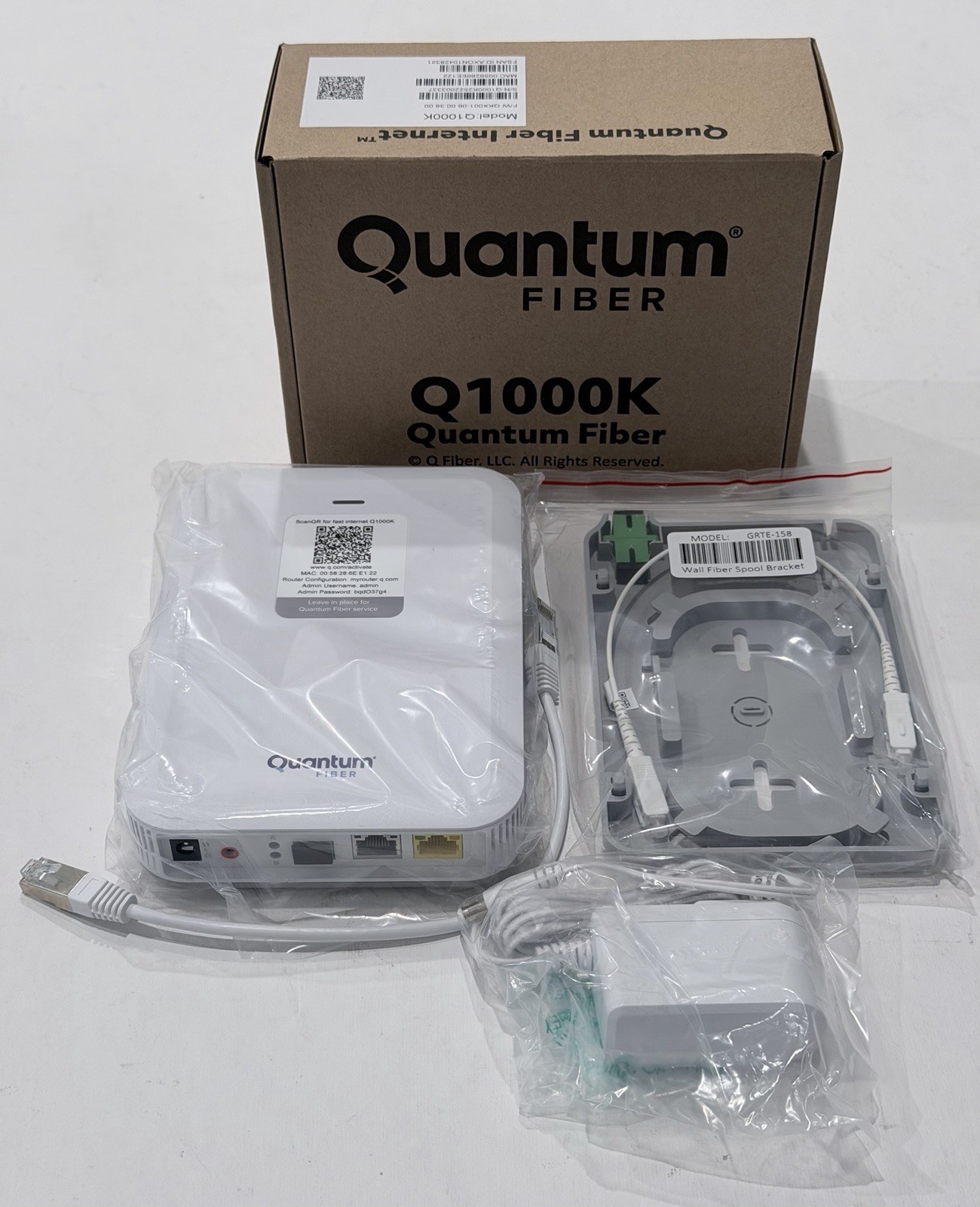 NEW QUANTUM FIBER INTERNET Q1000K SMARTNID MODEM W/ WALL FIBER SPOOL BRACKET