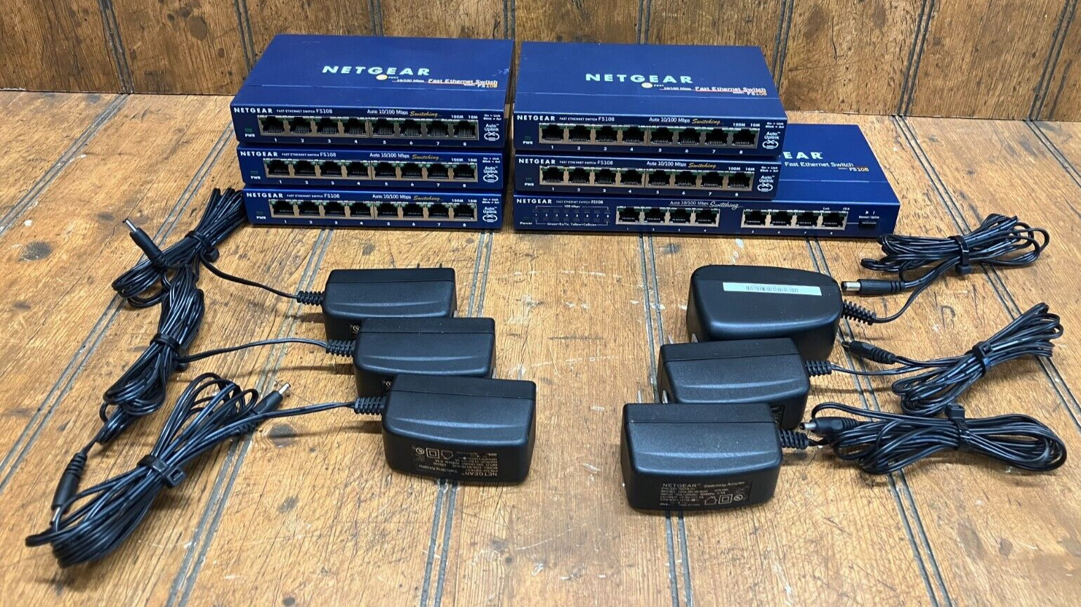 6 Netgear Model FS108 8 Port Fast Ethernet Switches 10/100 Mbps w/Power Supplies
