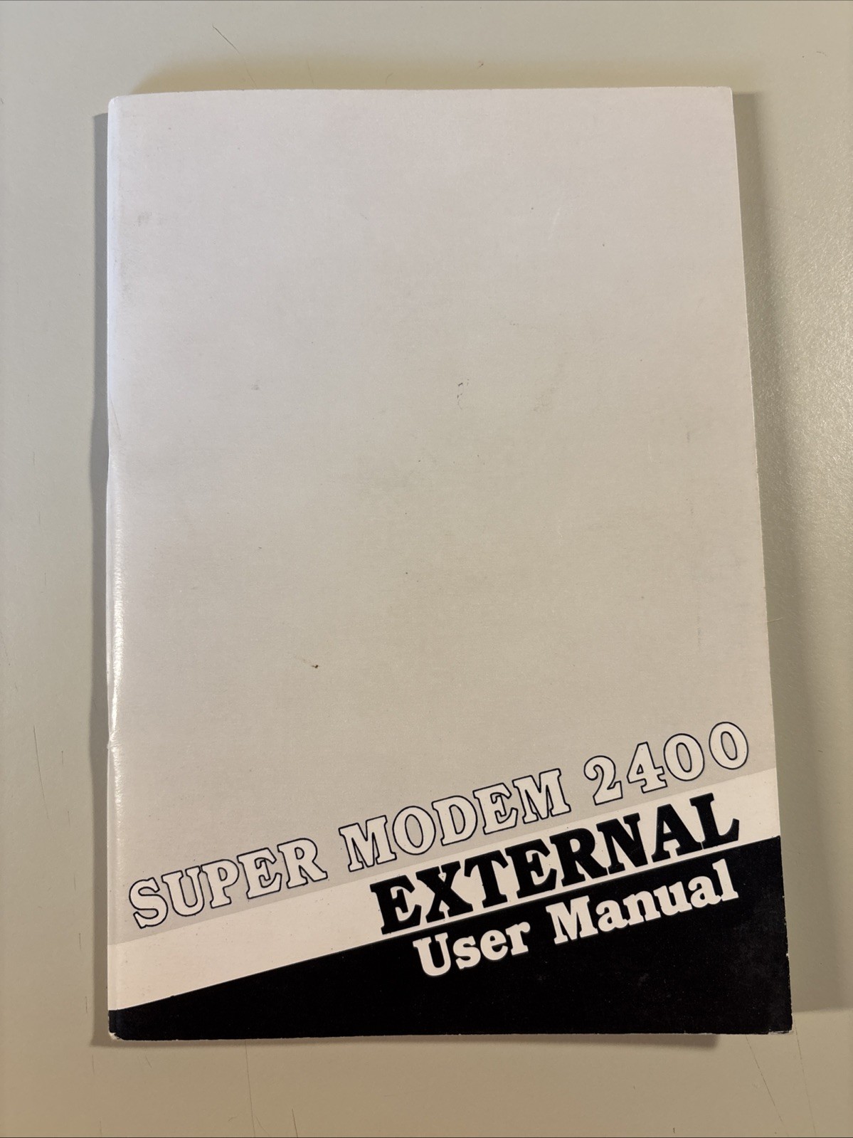 Vintage 1986 SUPER MODEM 2400 External User Manual
