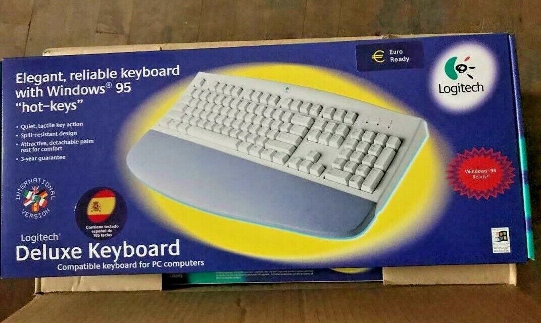 NEW LOGITECH DELUXE AT PS2 KEYBOARD WITH WRIST REST IN FULL RETAIL BOX