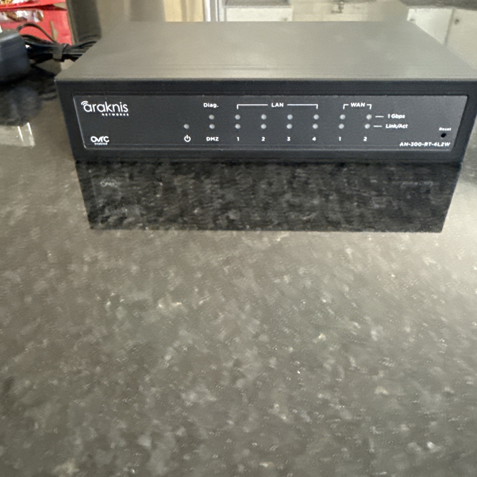 Araknis AN-300-RT-4L2W Dual-WAN Gigabit VPN Router 300 Series, Pre Owned