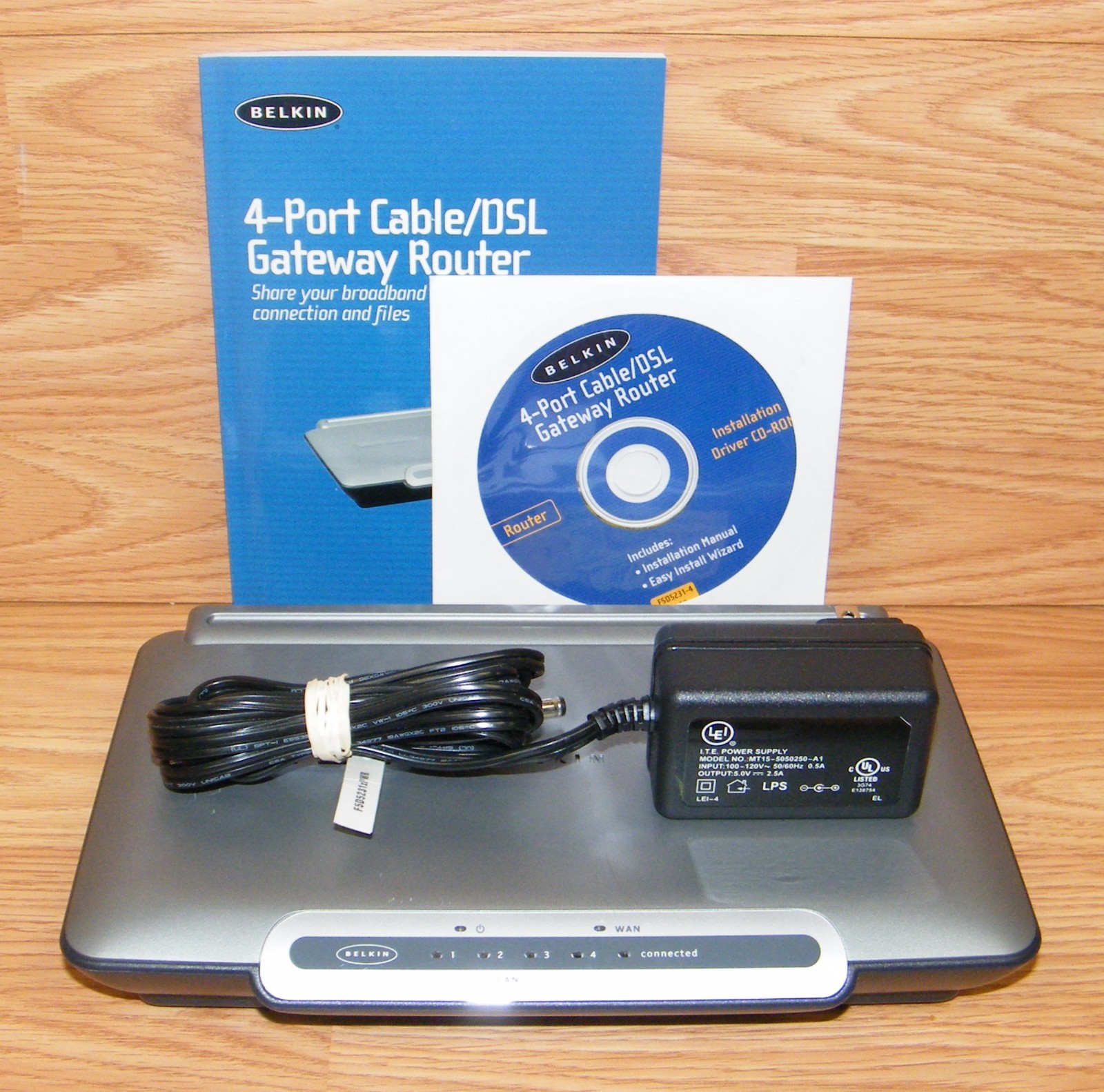 Belkin (F5D5231-4) 4-Port 10/100 Cable/DSL Gateway Router w/ Power Supply Bundle