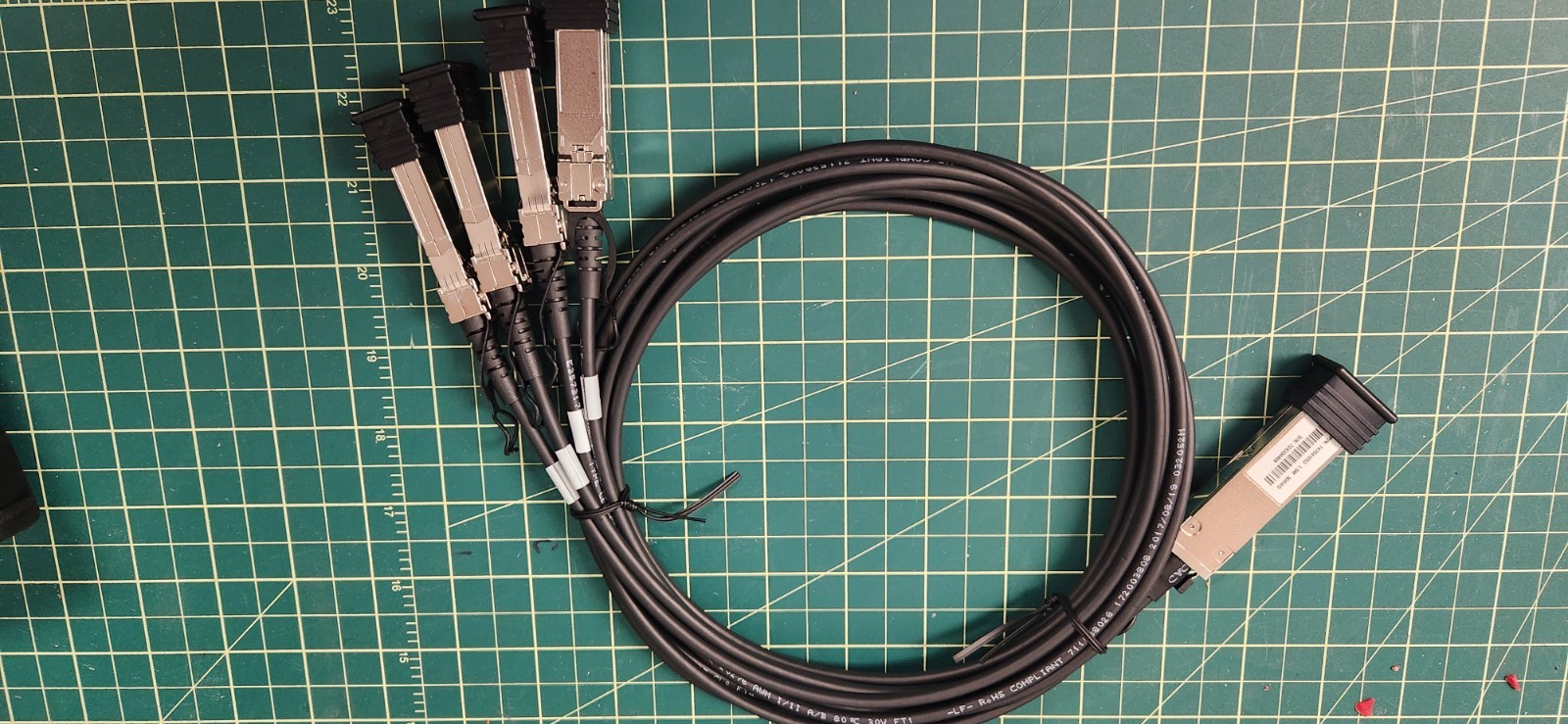 QTY 4   Molex 74764-1053 1.5M 30AWG 10GB QSFP+ to 4SFP+ Cable New Unopened