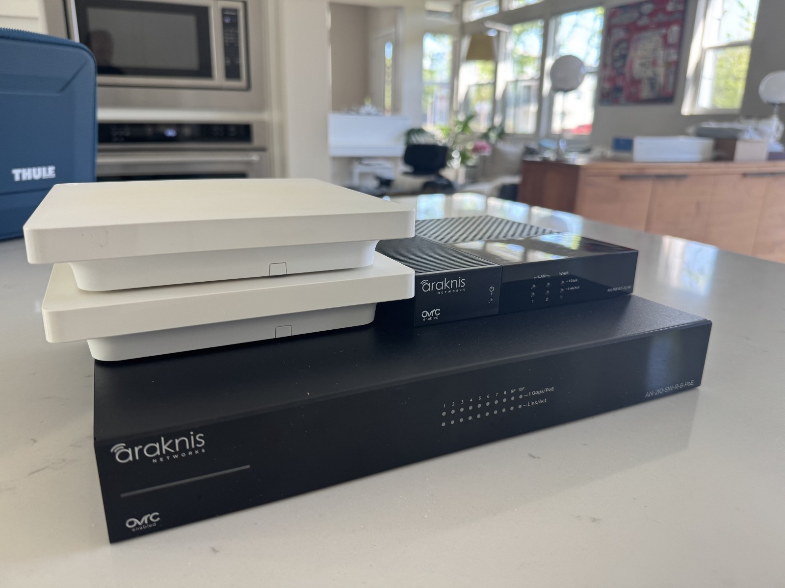 networking equipment: Araknis Switch, Router, access points