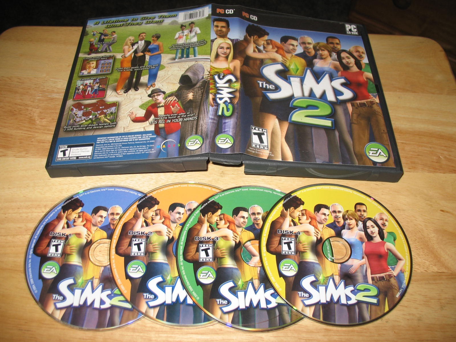 The Sims 2 PC 4 CD-ROMs Electronic Arts EA Games 2004 for Windows 98/Me/2000/XP