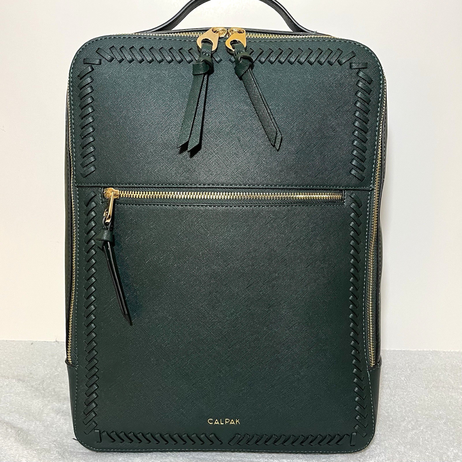 CALPAK Kaya Laptop Backpack Green Faux Leather Gold Tone Hardware Work Bag