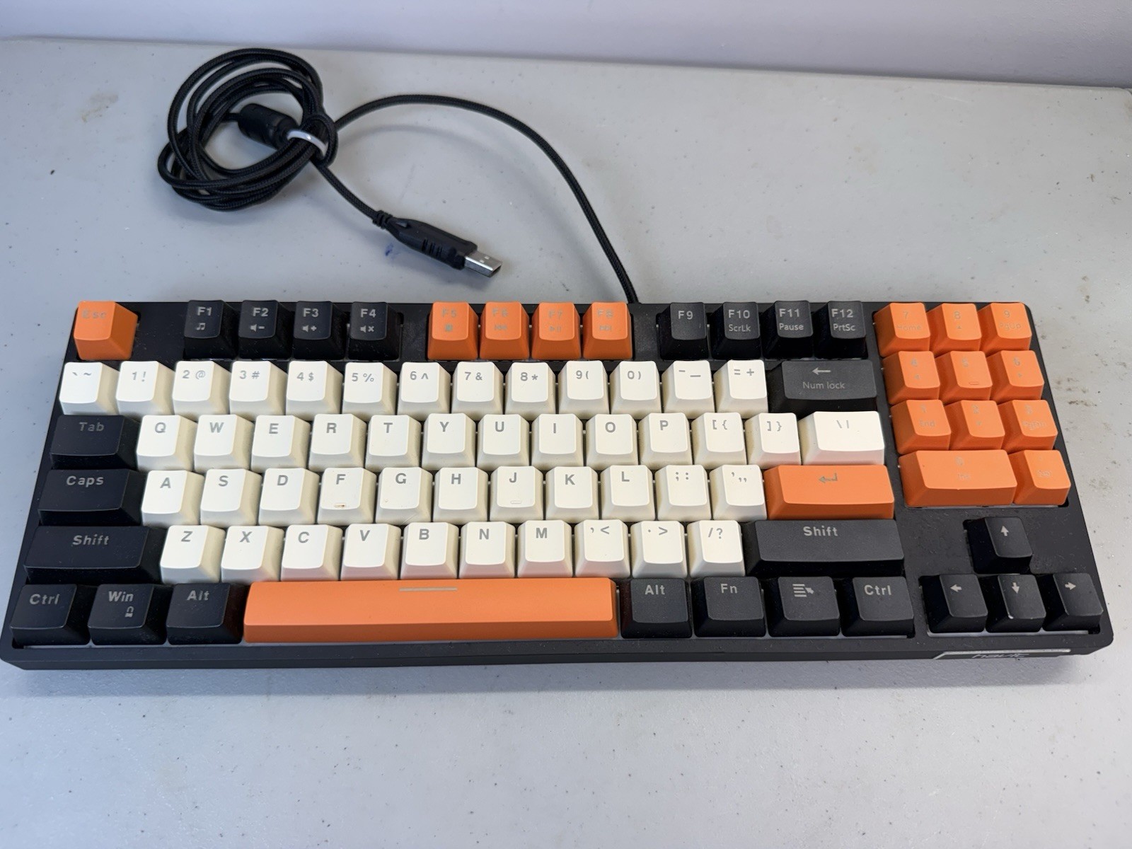 HAVIT KB487L Mechanical PC Keyboard Red Switch 89 Keys  (Black/Orange/White)