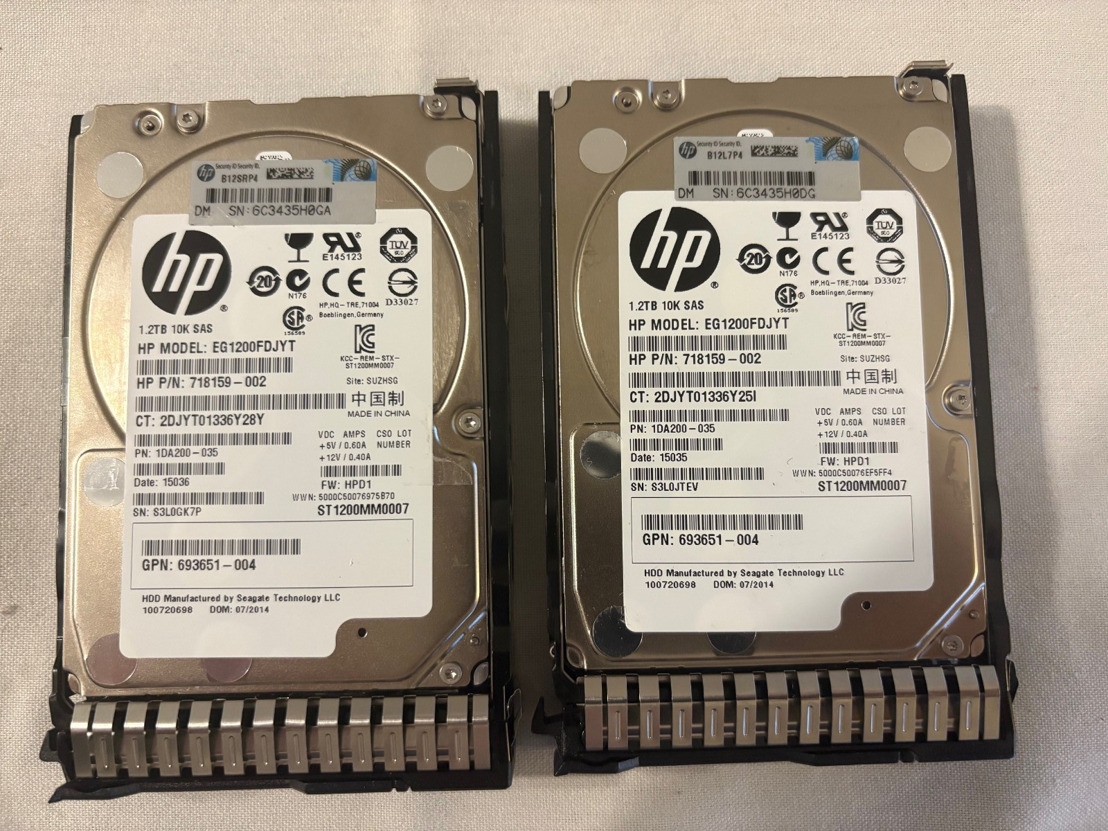 TWO - HP EG1200FDJYT 1.2TB 2.5" 10K RPM SAS Hard Drive HDD 718159-002 W/ Caddy