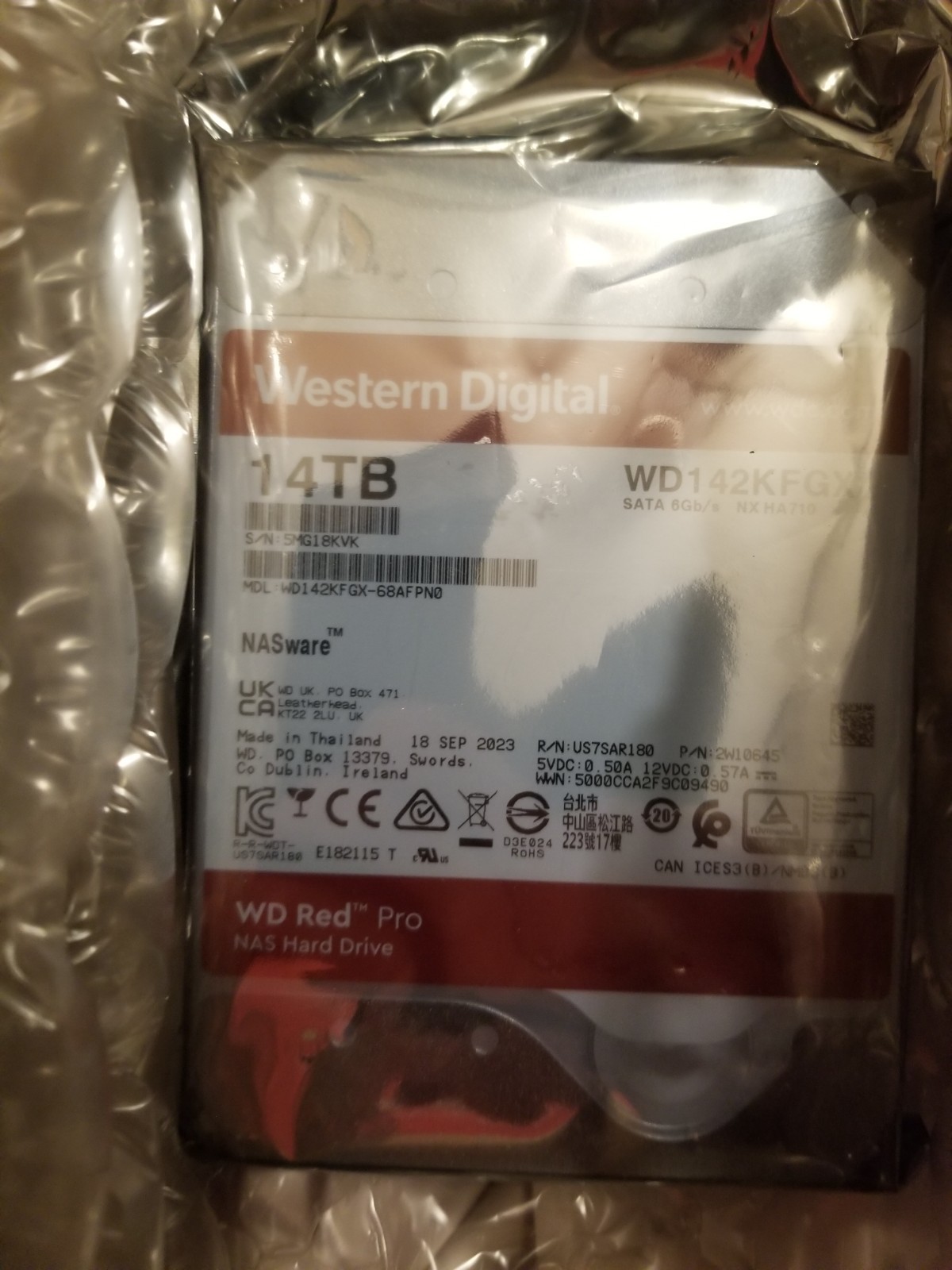 Brand new Western Digital WD Red Pro 14TB NAS HardDrive (Model WD142KFGX). Read