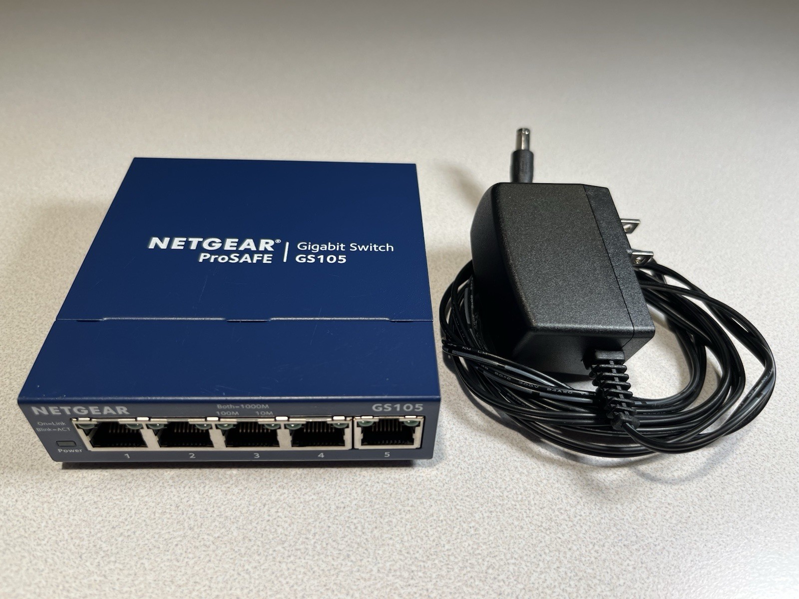 Netgear ProSAFE 5 Port Gigabit Switch Model GS105v5 with Power Adapter