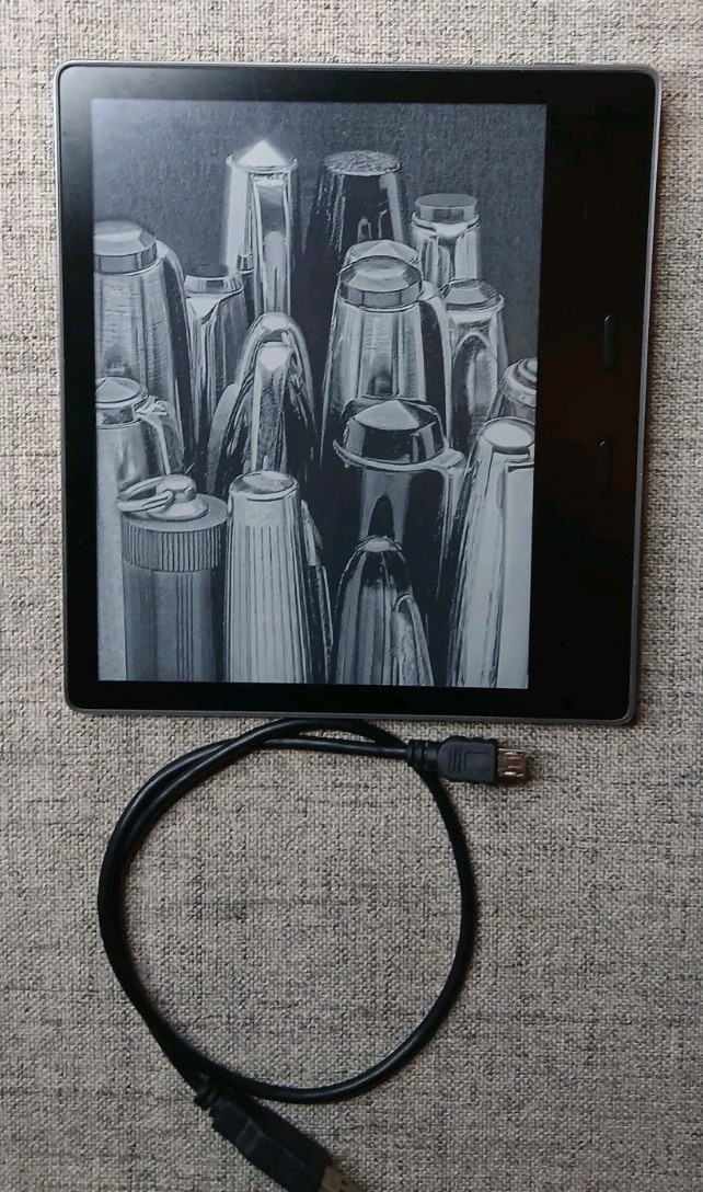 Amazon Kindle Oasis (9th Generation) 32GB, Wi-Fi, 7in - Graphite with Amazon