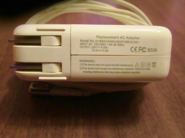 Replacement AC Adapter Model A1398/ preowned. tested.
