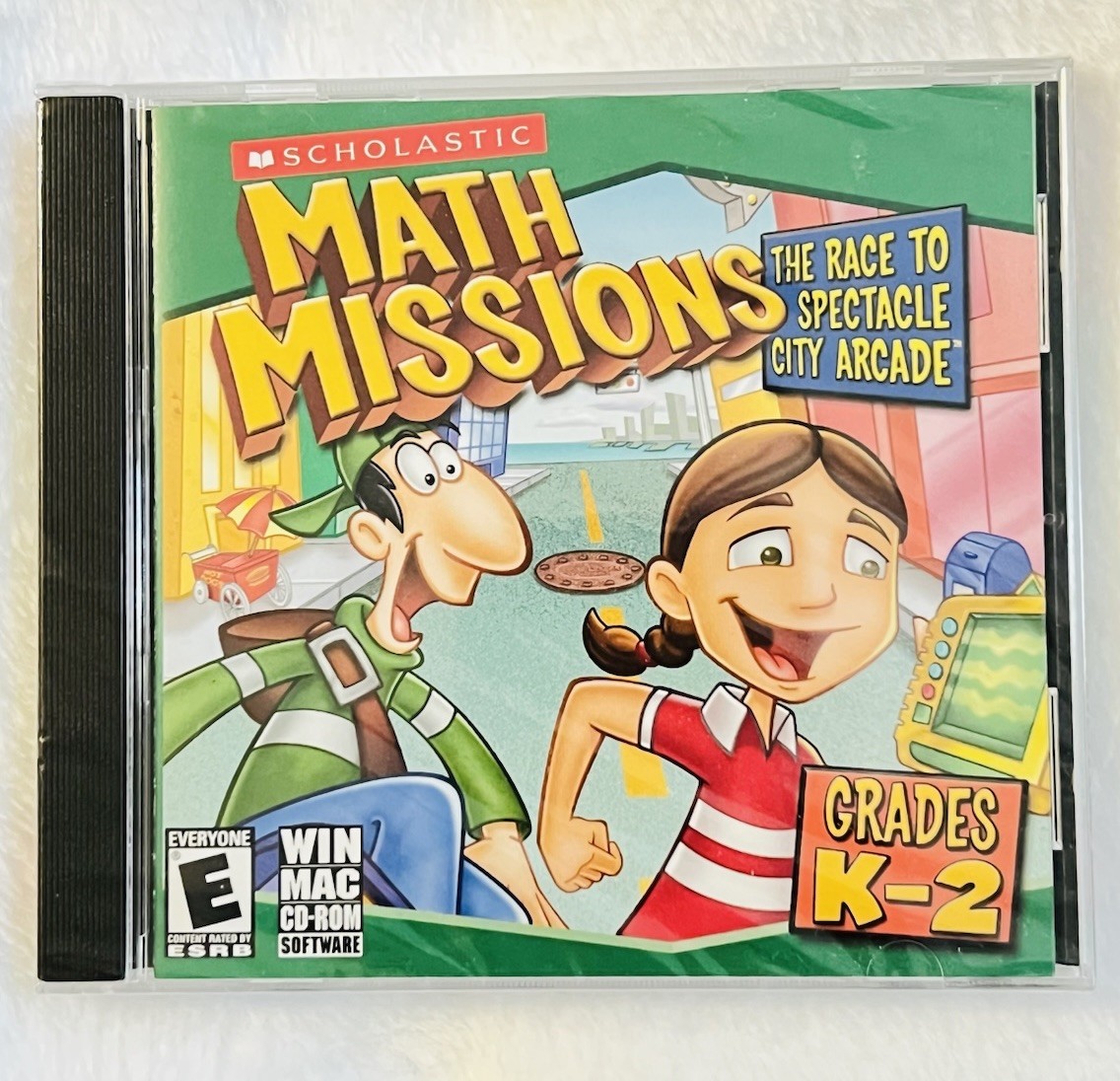 Scholastic Math Missions: The Race to Spectacle City Arcade Grades K-2 Win / Mac